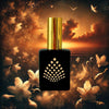 Perfume bottle with gold cap and black square design against a mystical floral background