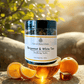 Bergamot & White Tea Soaking Salts with a glass of tea and oranges on a natural background.