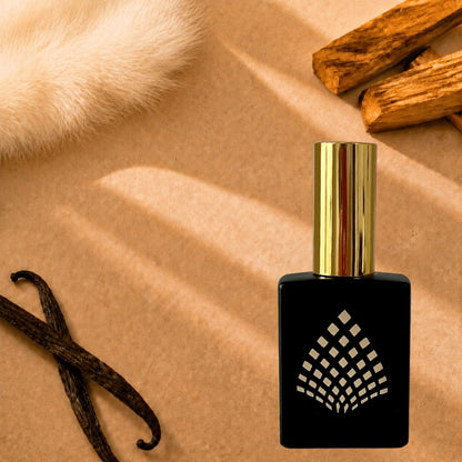 A black perfume bottle with vanilla beans, wood pieces, and faux fur.