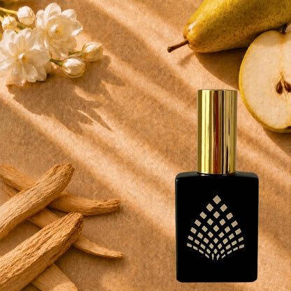 A black perfume bottle on a brown kraft-paper surface with pear, jasmine, and sandalwood.