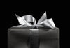 Black and white gift box picture representing. gift card option for Couture Home & Body.